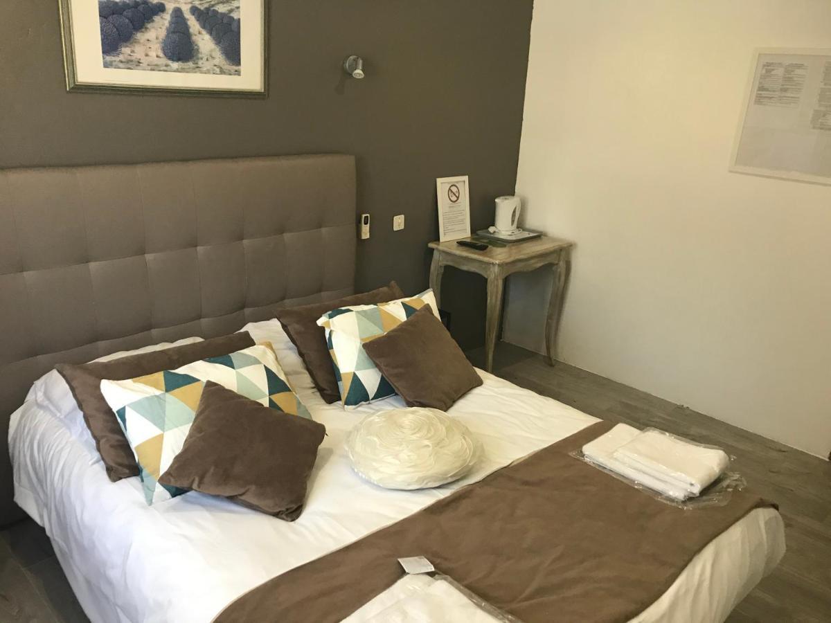 Hotel Les Mimosas Bormes-les-Mimosas Bagian luar foto
